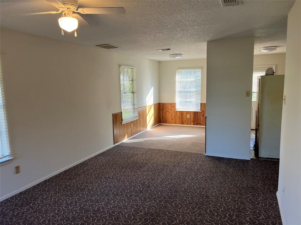 3711 Greenwood Road Weatherford, TX 76088 - Photo 6 of 15 a view of livingroom with hardwood floor and a ceiling fan