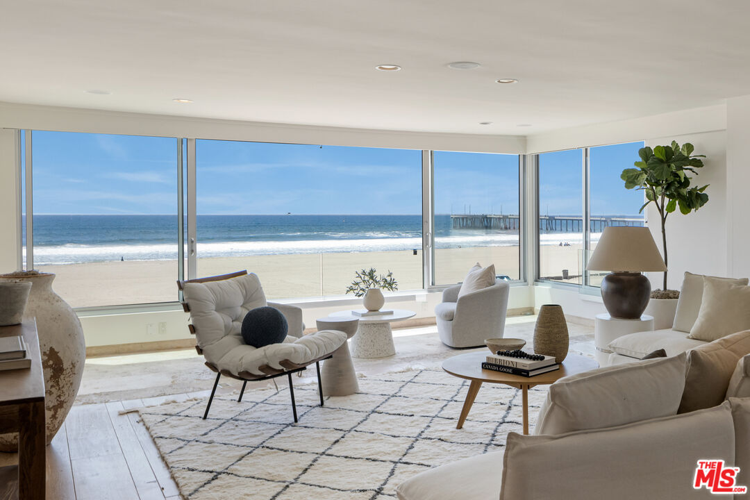 3412 Ocean Front Walk, Unit 201 Marina del Rey, CA 90292 - Photo 1 of 23 a living room with furniture and floor to ceiling window