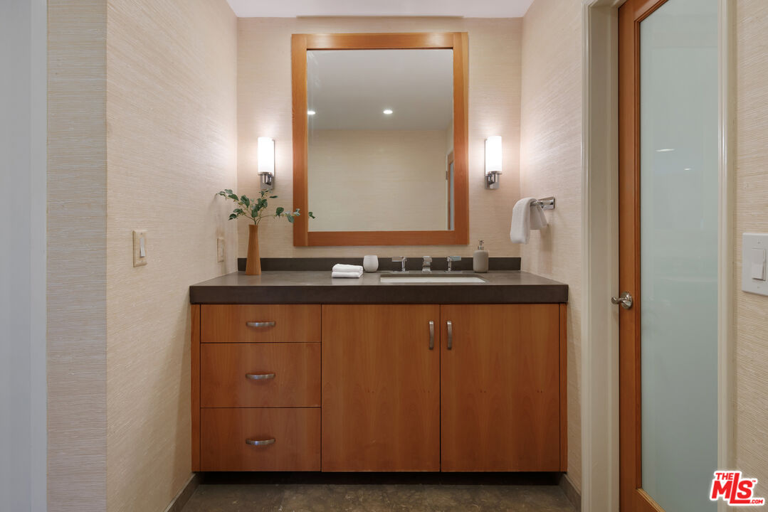 3412 Ocean Front Walk, Unit 201 Marina del Rey, CA 90292 - Photo 11 of 23 a bathroom with a sink and a mirror