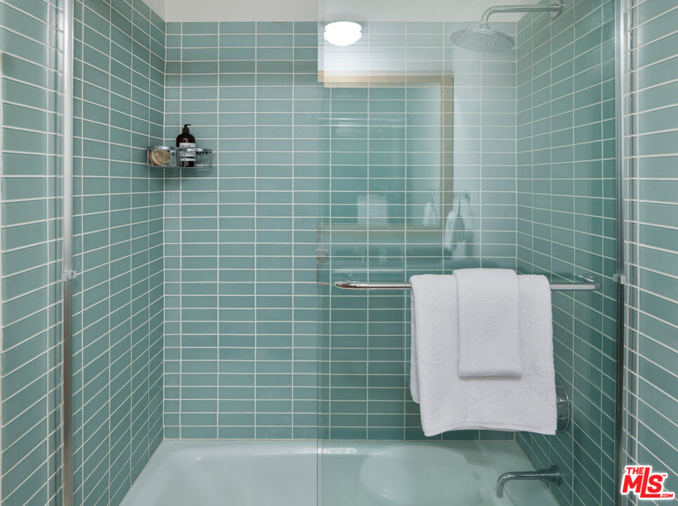 3412 Ocean Front Walk, Unit 201 Marina del Rey, CA 90292 - Photo 14 of 23 a bathroom with a shower