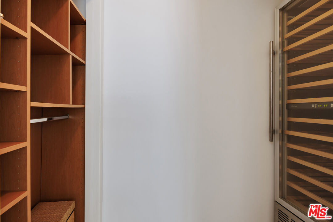 3412 Ocean Front Walk, Unit 201 Marina del Rey, CA 90292 - Photo 17 of 23 a view of closet with wooden floor