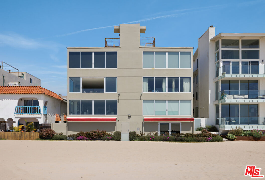 3412 Ocean Front Walk, Unit 201 Marina del Rey, CA 90292 - Photo 20 of 23 a front view of a multi story building