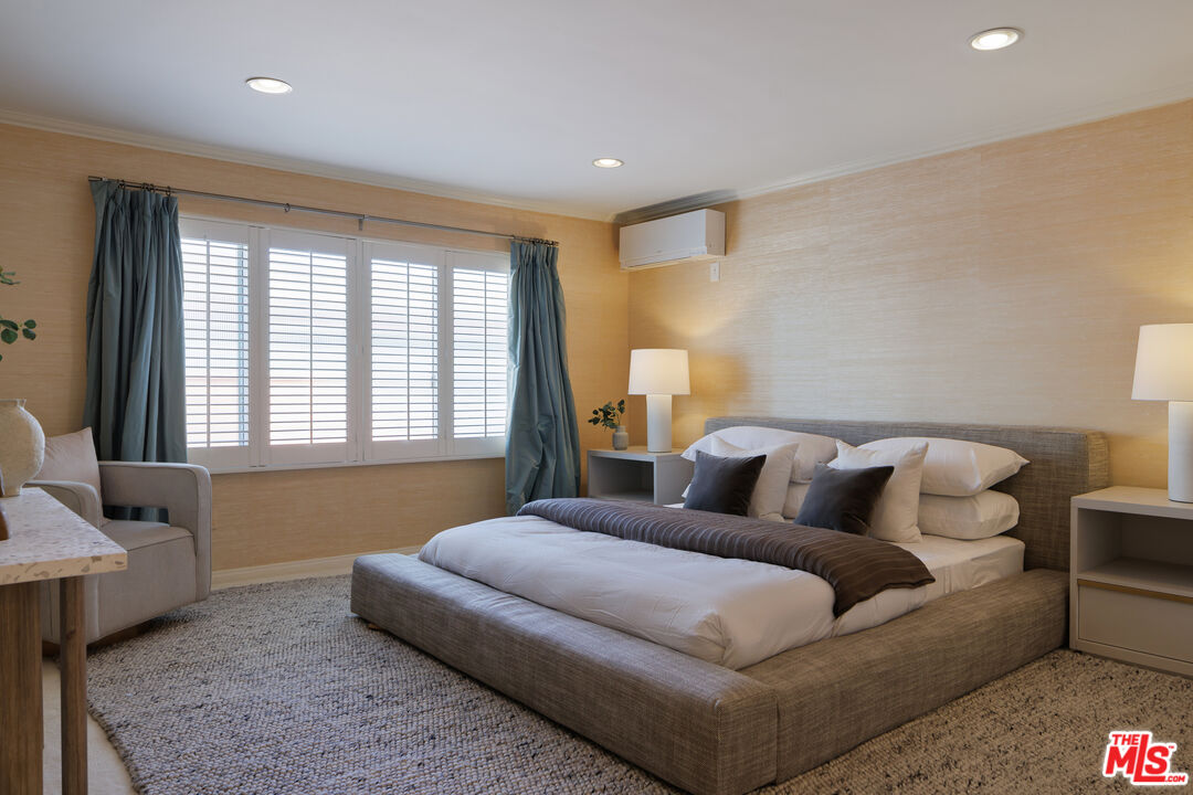3412 Ocean Front Walk, Unit 201 Marina del Rey, CA 90292 - Photo 9 of 23 a bedroom with a bed and a couch
