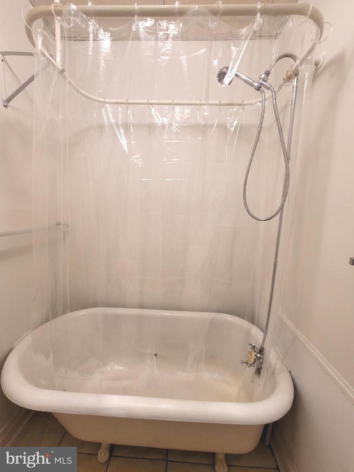 37 East Main Street, Unit 2 Waynesboro, PA 17268 - Photo 22 of 25 a bathroom with a white bath tub