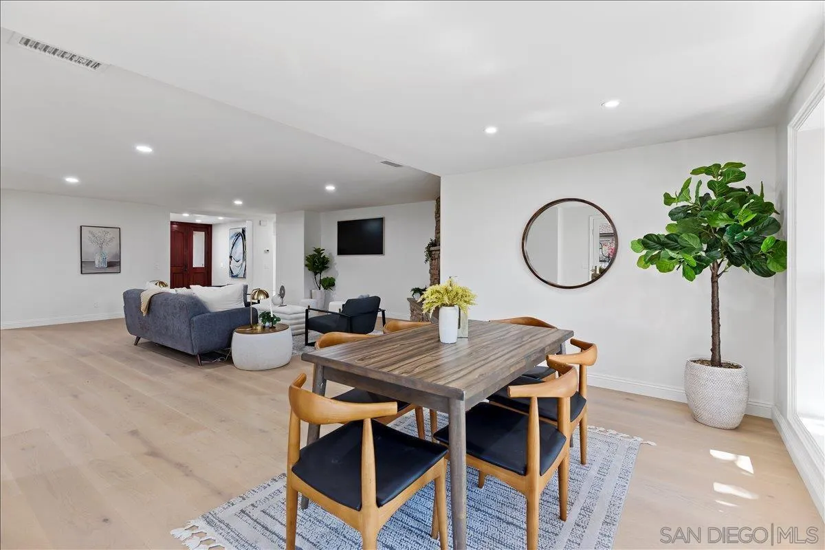 16902 Via De Santa Fe, Unit 12 Rancho Santa Fe, CA 92091 - Photo 21 of 54 a living room with furniture a window and a potted plant