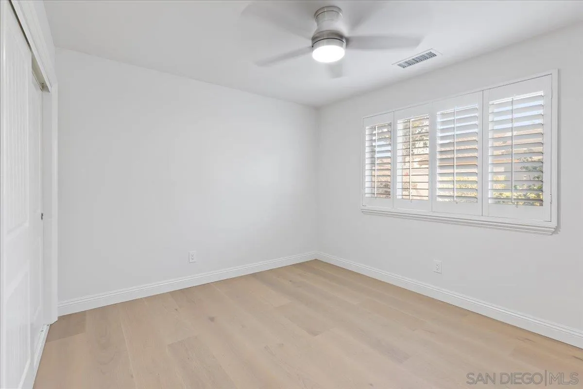 16902 Via De Santa Fe, Unit 12 Rancho Santa Fe, CA 92091 - Photo 24 of 54 an empty room with a window