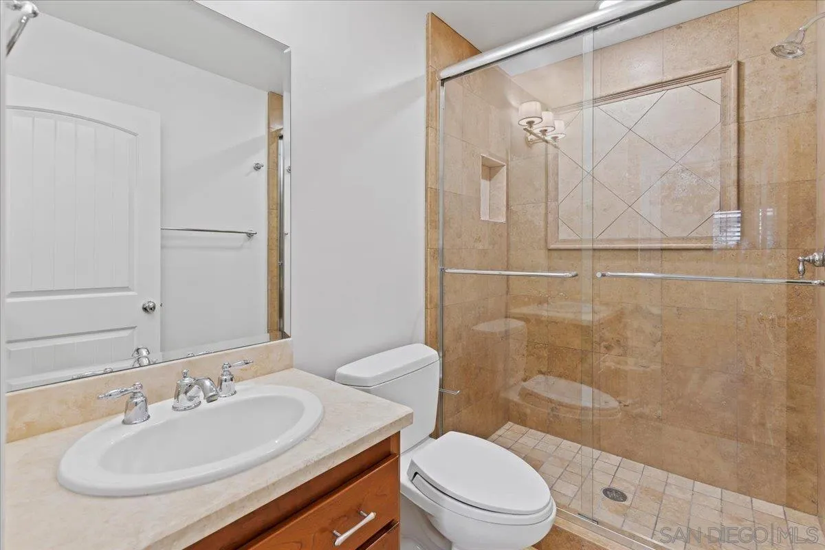 16902 Via De Santa Fe, Unit 12 Rancho Santa Fe, CA 92091 - Photo 26 of 54 a bathroom with a sink toilet and shower