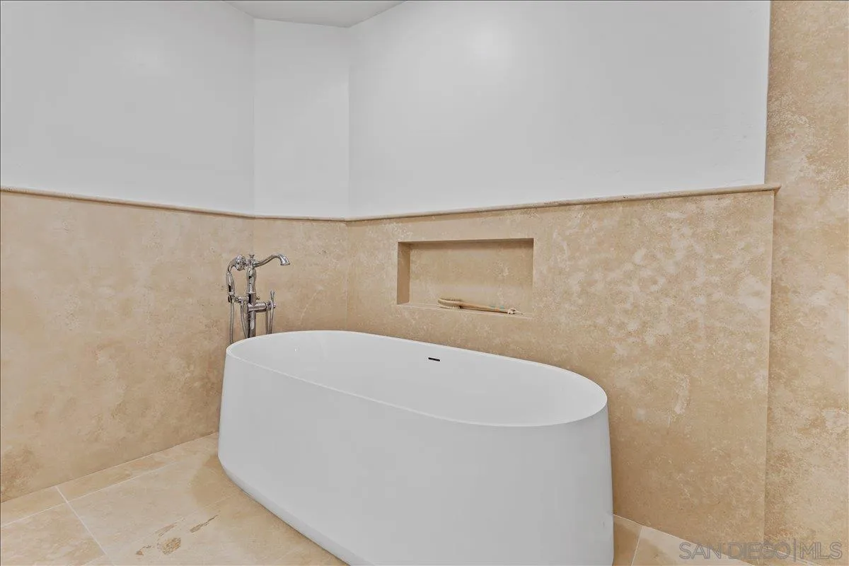 16902 Via De Santa Fe, Unit 12 Rancho Santa Fe, CA 92091 - Photo 40 of 54 a bathroom with a bathtub