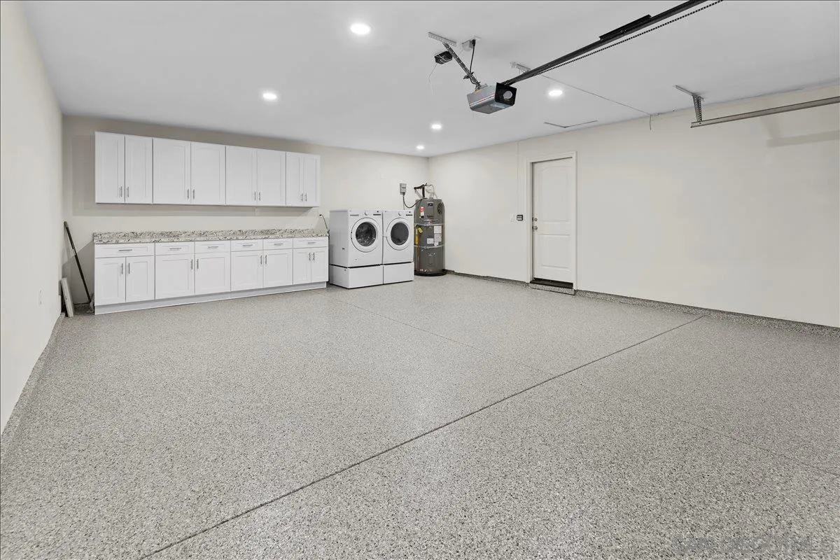 16902 Via De Santa Fe, Unit 12 Rancho Santa Fe, CA 92091 - Photo 41 of 54 a view of a livingroom with kitchen view and a window