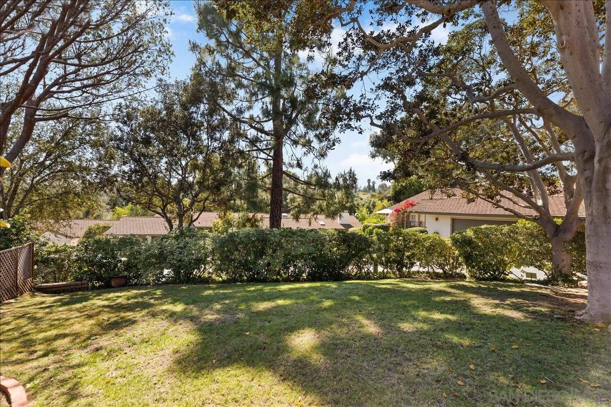16902 Via De Santa Fe, Unit 12 Rancho Santa Fe, CA 92091 - Photo 50 of 54 a view of a yard in front of the house
