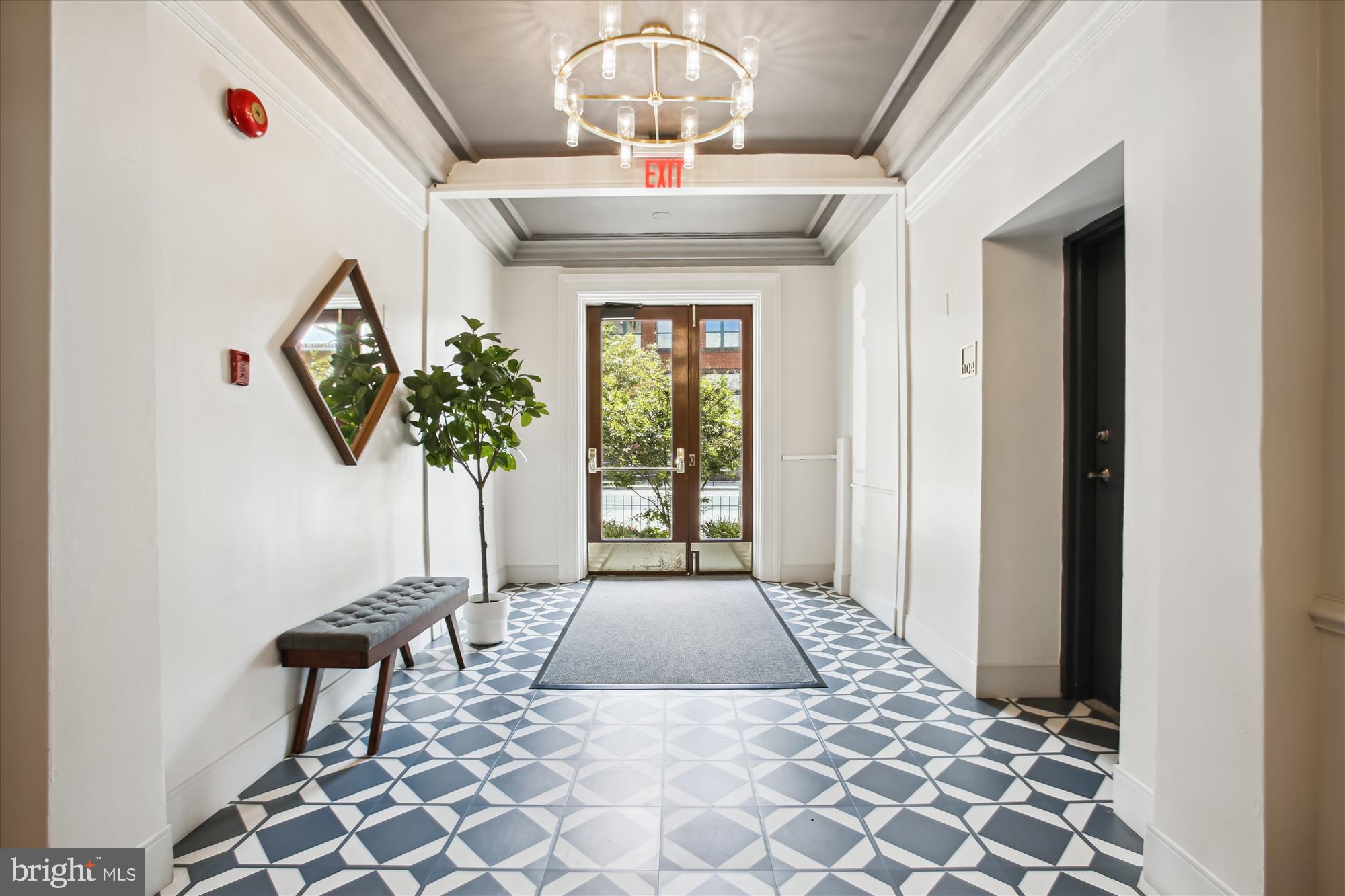 1669 Columbia Road Northwest, Unit 210 Washington, DC 20009 - Photo 29 of 33 Lobby looking out to Columbia Rd NW