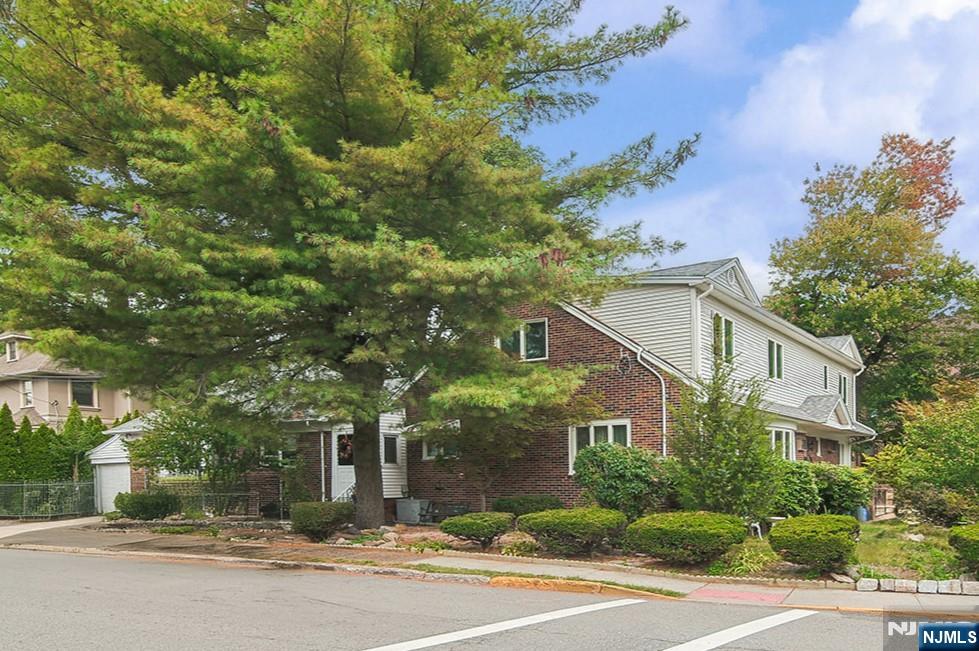 1003 Cumbermeade Road Fort Lee, NJ 07024 - Photo 3 of 23 a view of a white house with a street