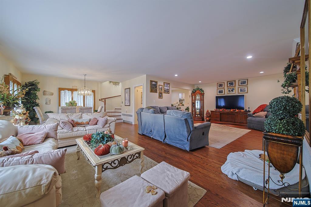 1003 Cumbermeade Road Fort Lee, NJ 07024 - Photo 6 of 23 a living room with furniture and a fireplace