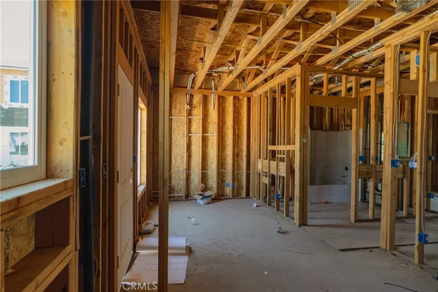 a view of a room with wooden walls