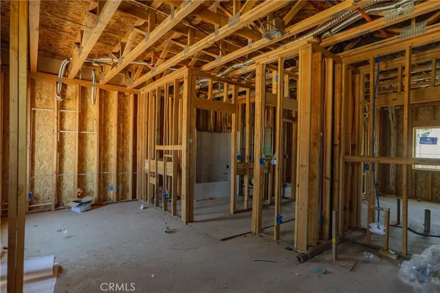 a view of a room with large windows
