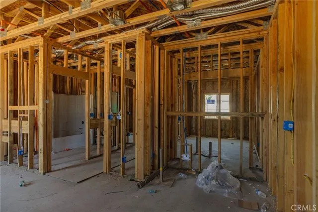 a view of a room with wooden walls