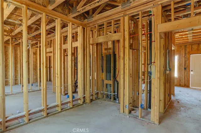 a view of a room with large windows