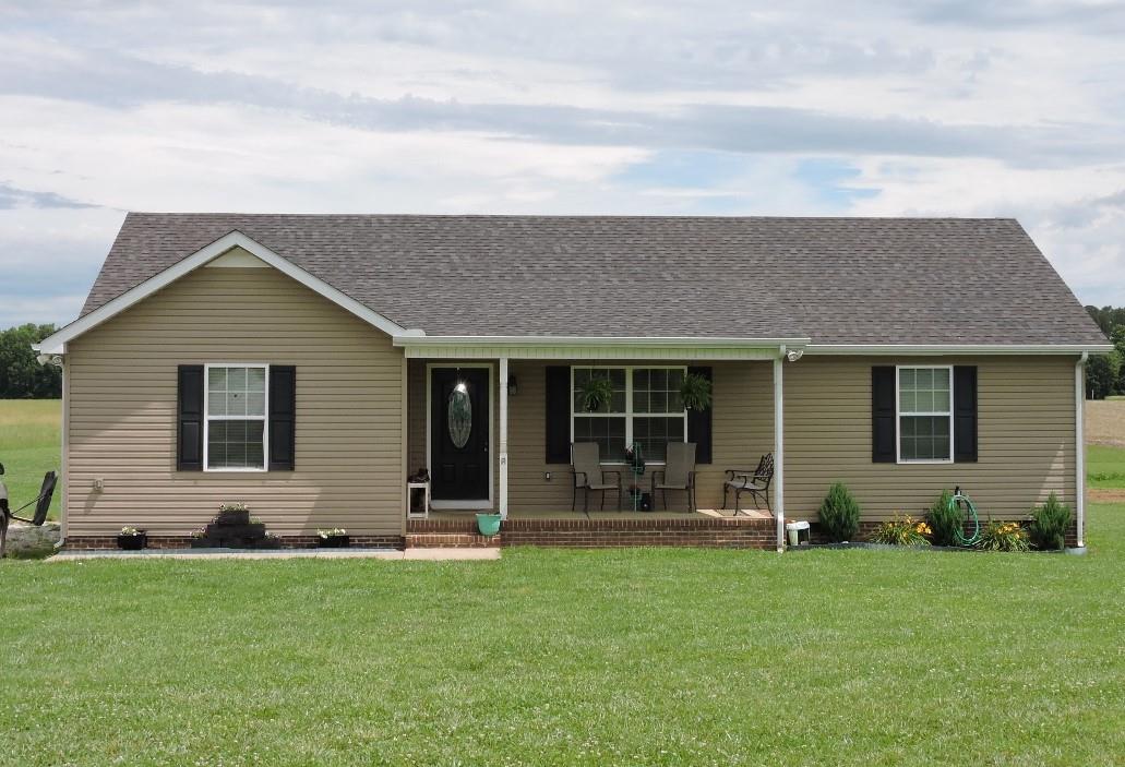 259 Bell Road Morrison, TN 37357 - Photo 1 of 27 front view of house with a yard
