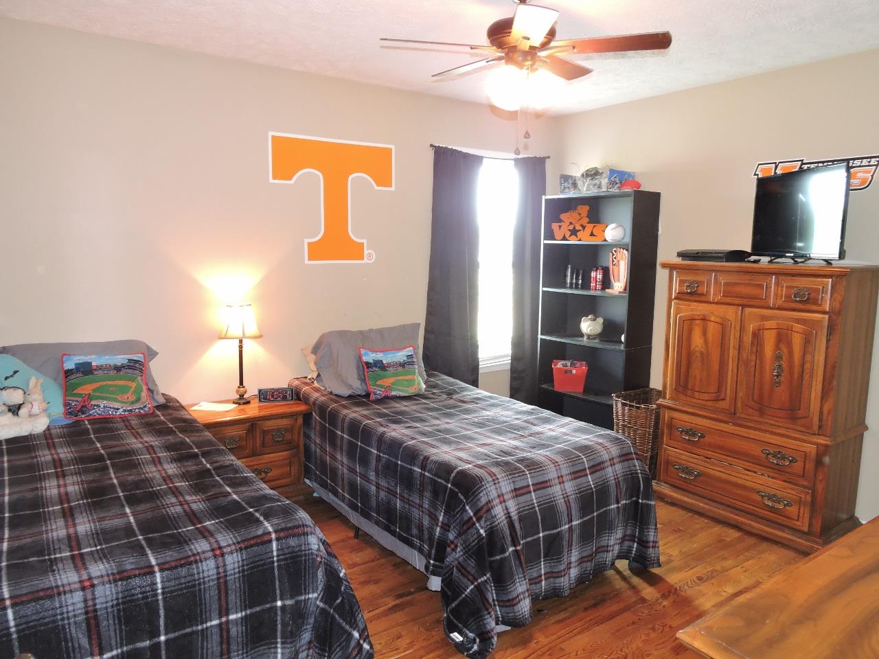 259 Bell Road Morrison, TN 37357 - Photo 19 of 27 a bedroom with a bed and furniture