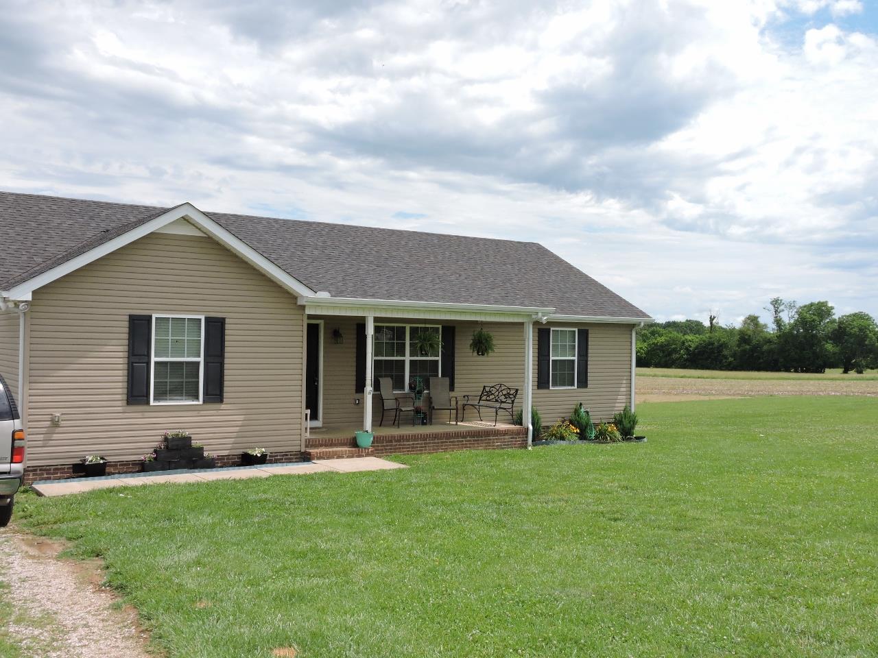 259 Bell Road Morrison, TN 37357 - Photo 3 of 27 a front view of house with yard and green space