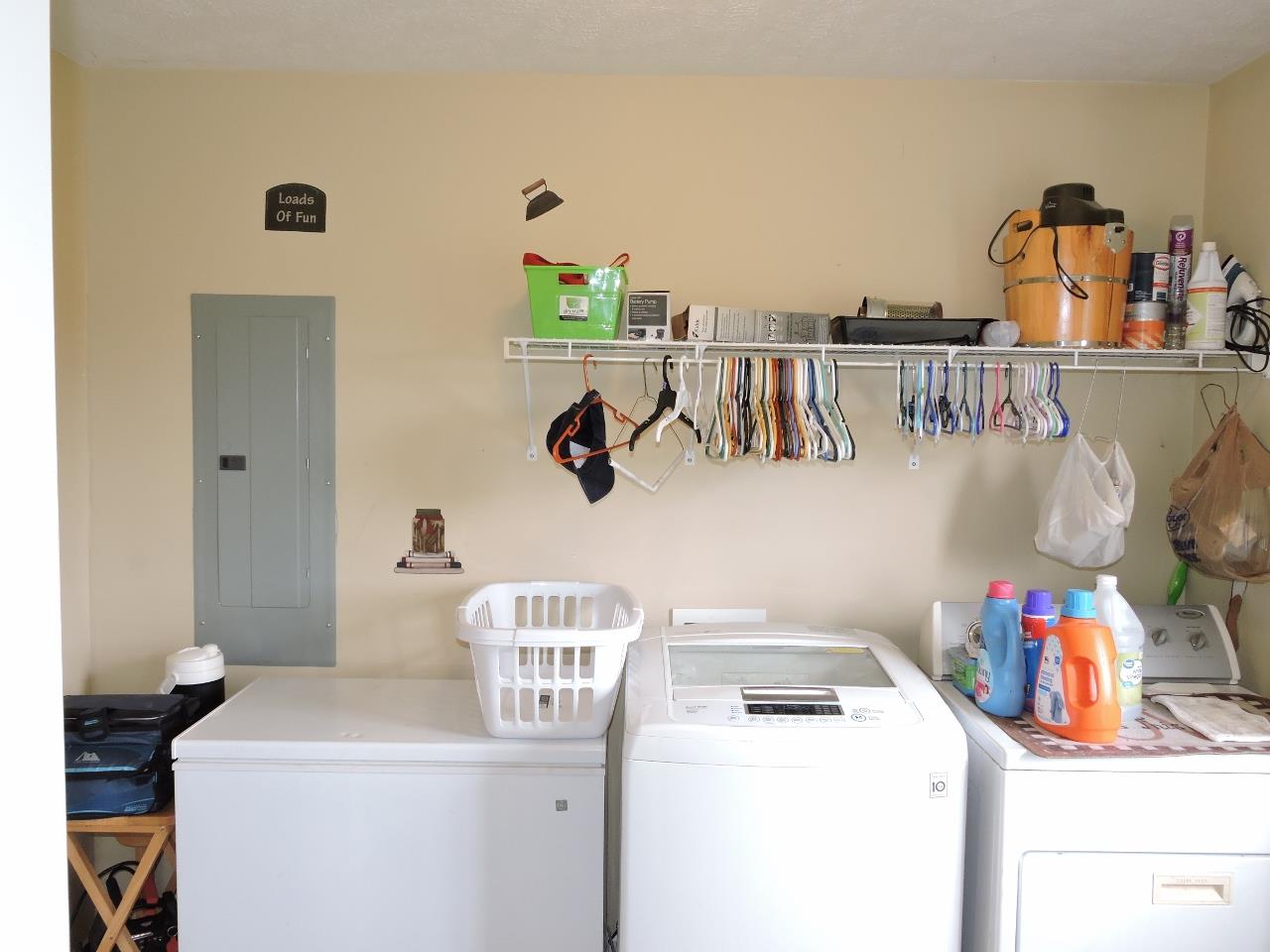 259 Bell Road Morrison, TN 37357 - Photo 22 of 27 a utility room with a sink dryer and washer