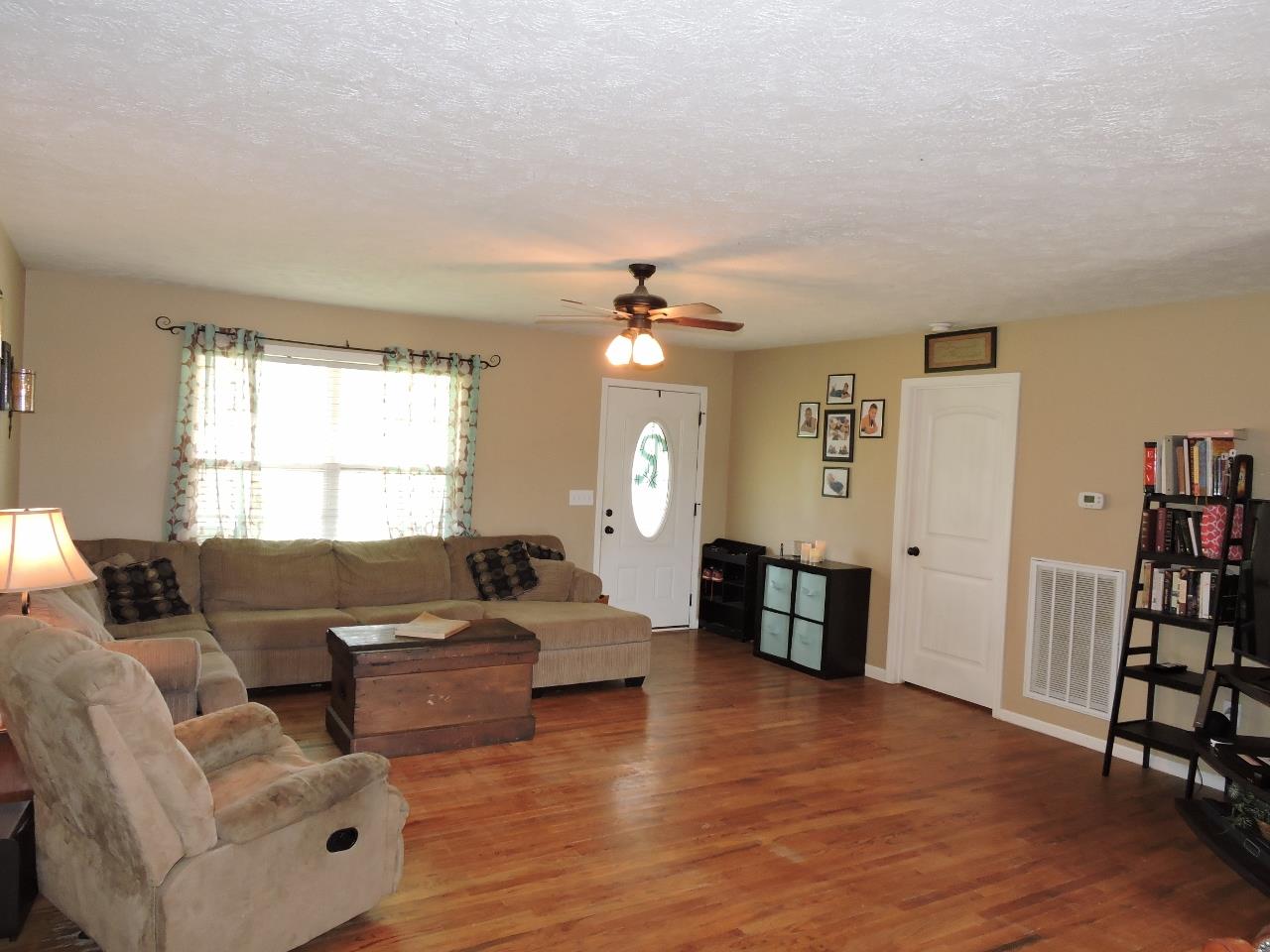 259 Bell Road Morrison, TN 37357 - Photo 5 of 27 a living room with furniture and a wooden floor