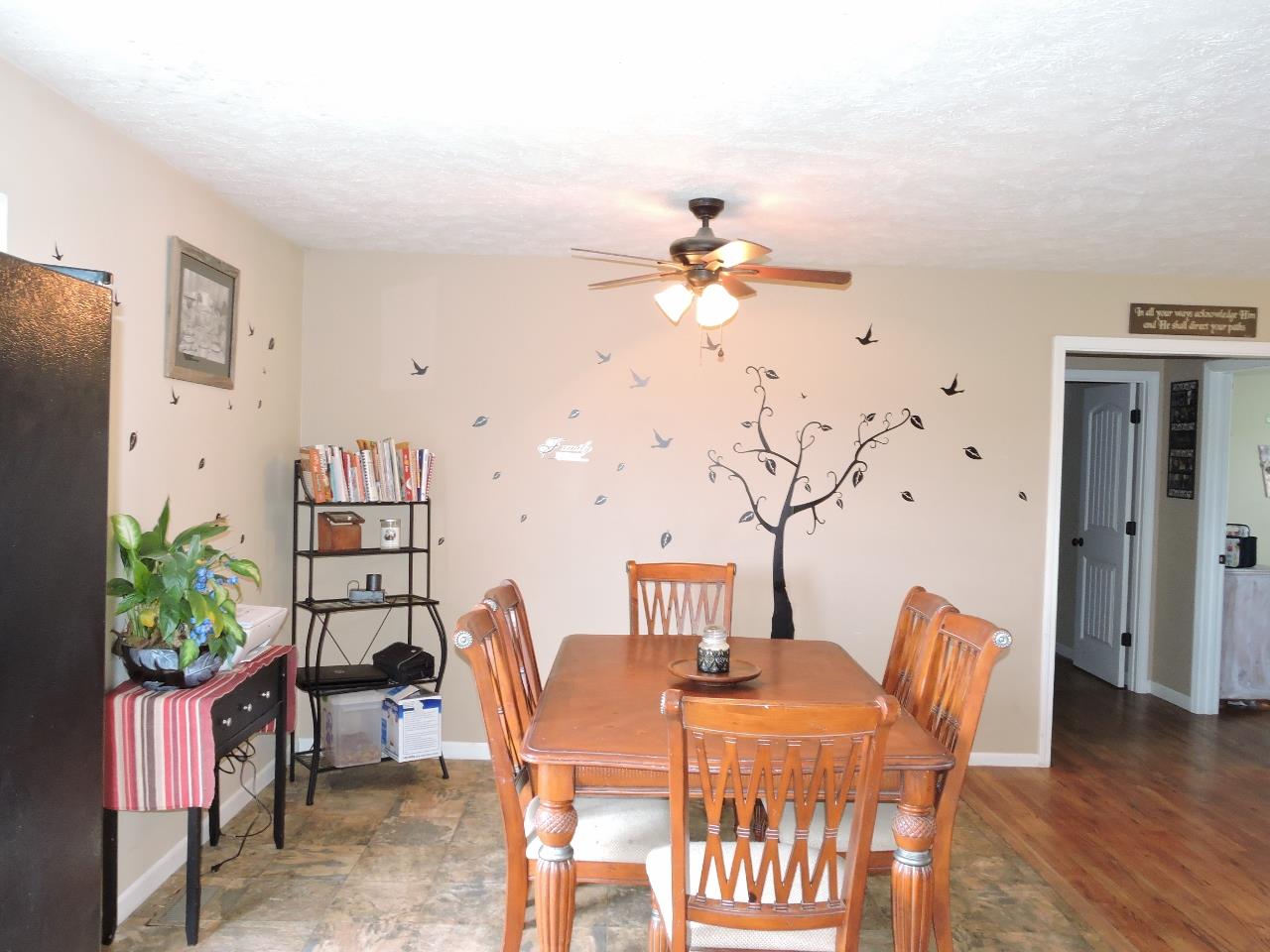 259 Bell Road Morrison, TN 37357 - Photo 7 of 27 a view of a dining room with furniture and wooden floor