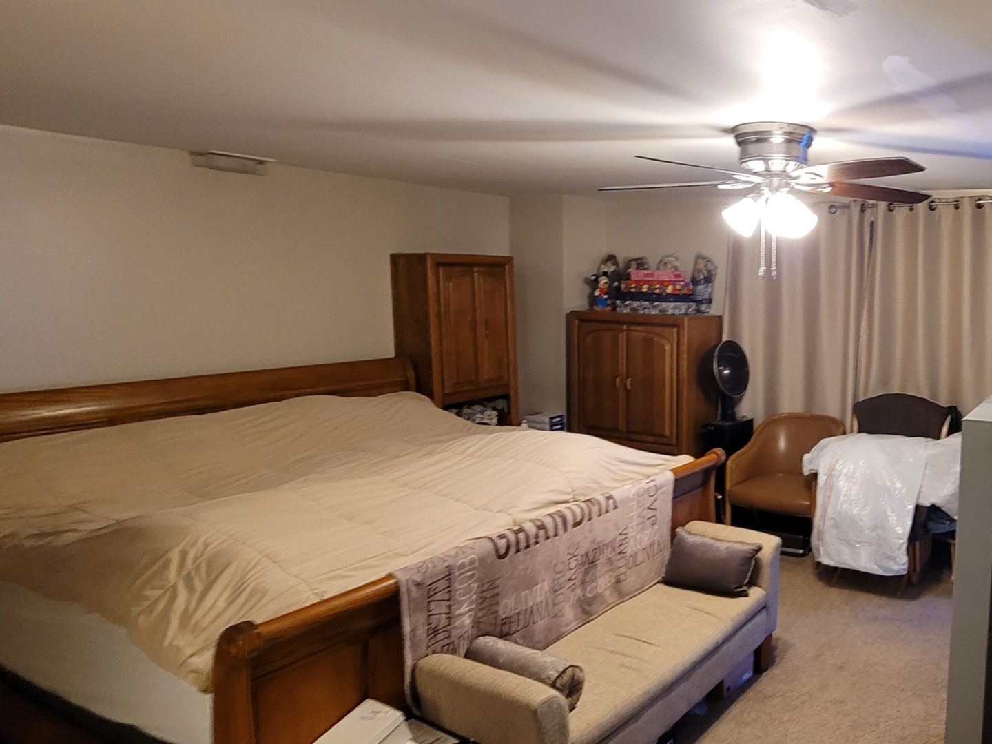 7432 West Gregory Street Chicago, IL 60656 - Photo 18 of 42 a bedroom with bed furniture and chandelier