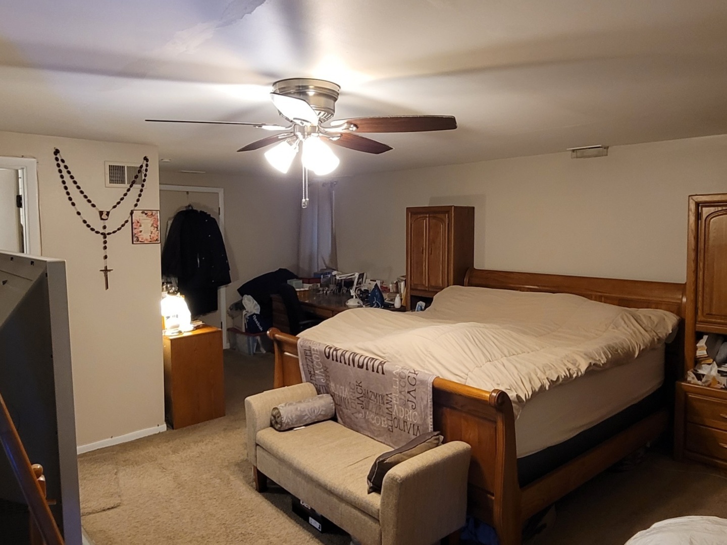 7432 West Gregory Street Chicago, IL 60656 - Photo 19 of 42 a spacious bedroom with a bed and a chandelier