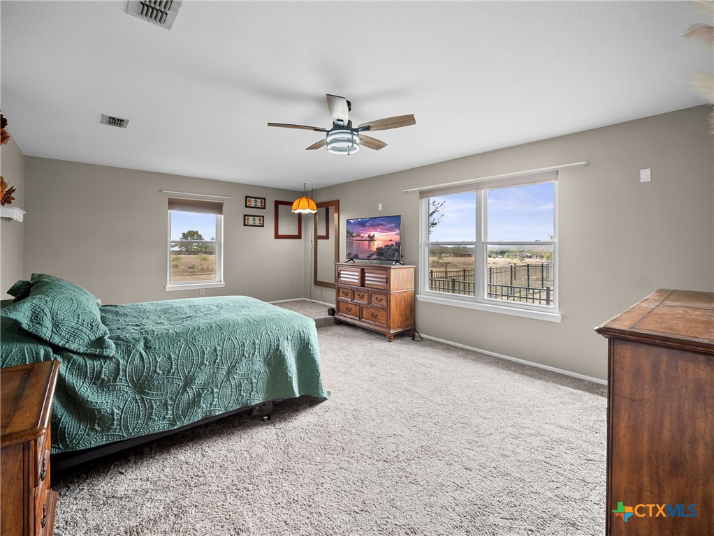 782 Santa Clara Loop Marion, TX 78124 - Photo 39 of 48 a bedroom with a bed and furniture