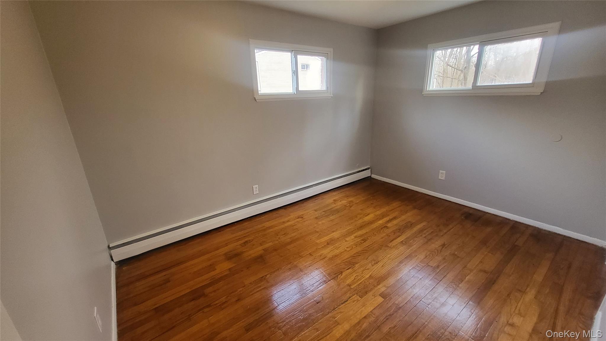 40 Haviland Road, Unit A7 Poughkeepsie, NY 12601 - Photo 12 of 12 an empty room with windows