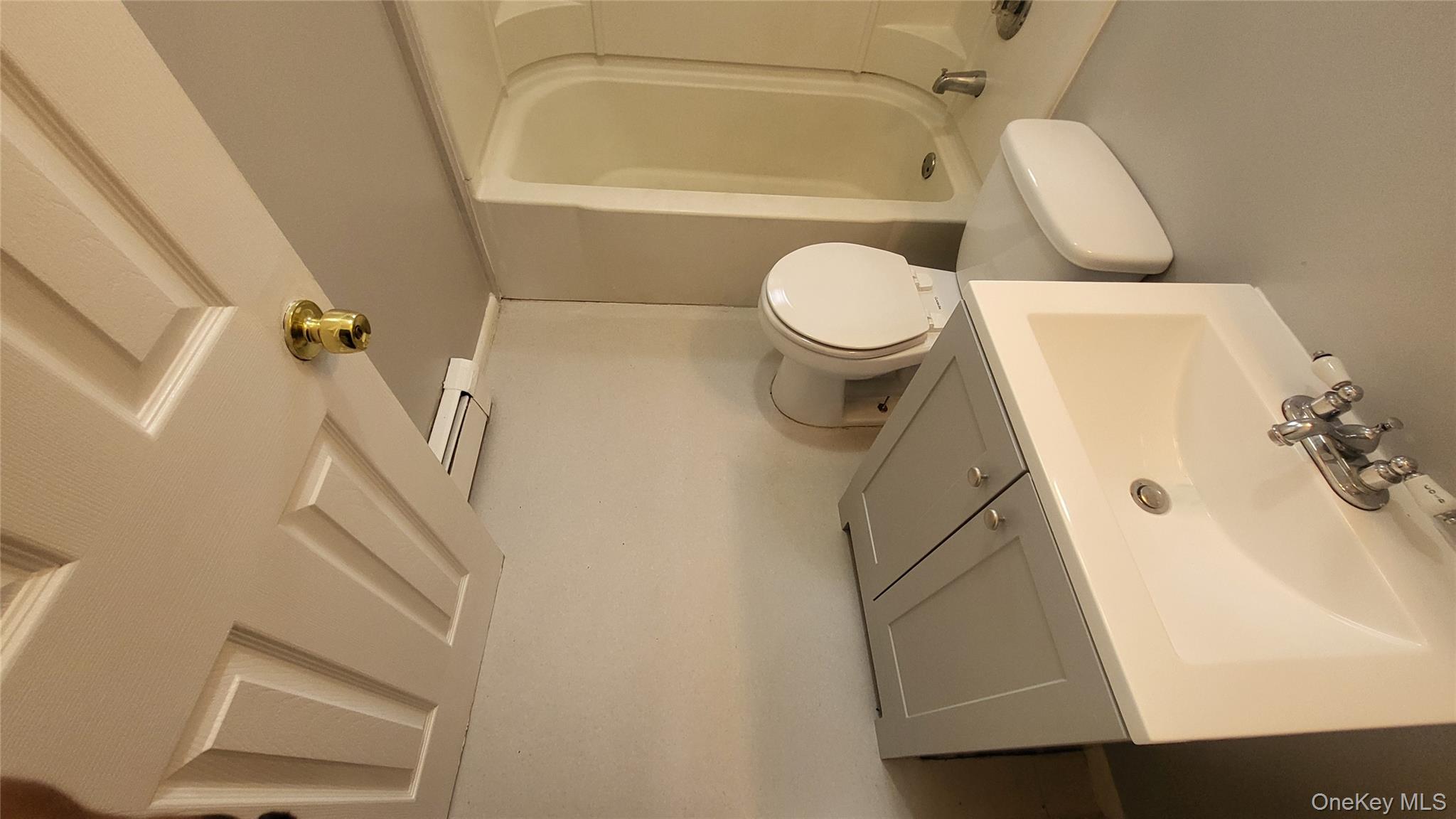 40 Haviland Road, Unit A7 Poughkeepsie, NY 12601 - Photo 7 of 12 a bathroom with a toilet and a sink