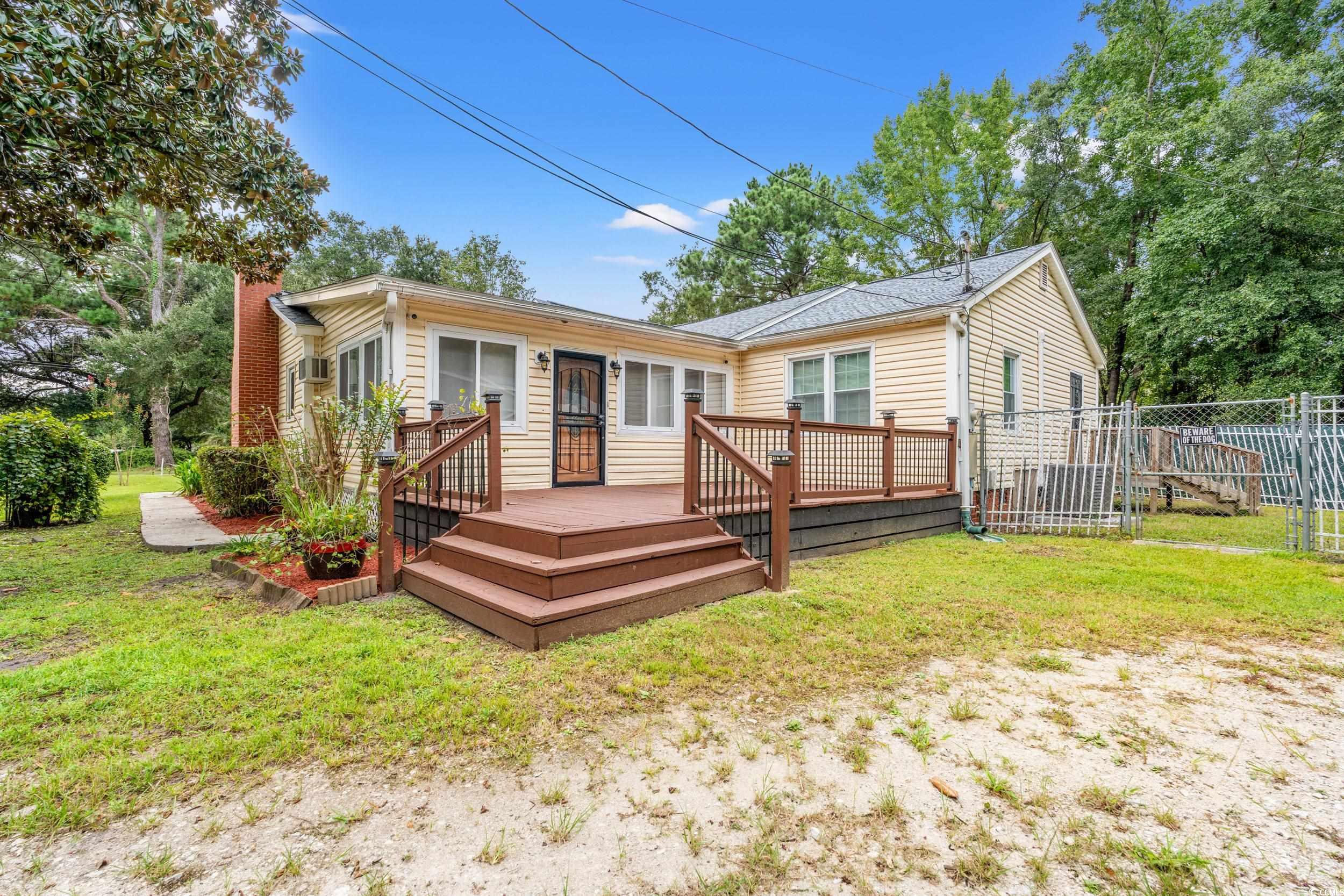 902 Palm Street Georgetown, SC 29440 - Photo 25 of 38 Rear view of house featuring a deck