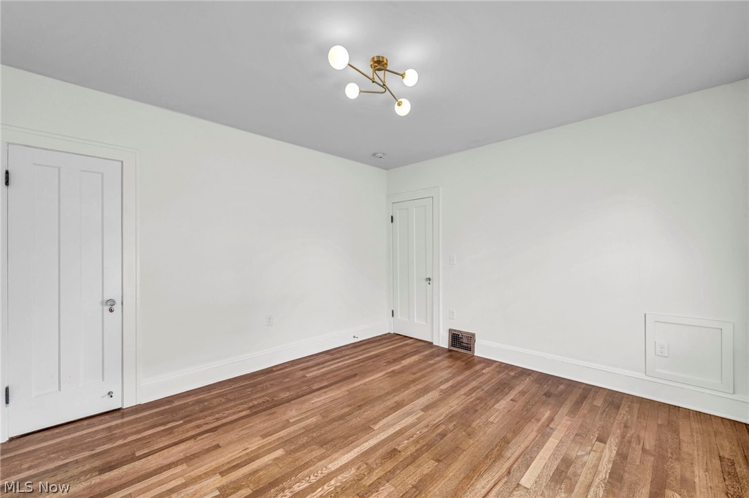 2135 Coventry Road, Unit DOWN Cleveland, OH 44118 - Photo 27 of 34 Unfurnished bedroom with wood finished floors and baseboards