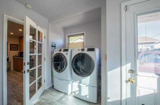 a utility room with dryer and washer