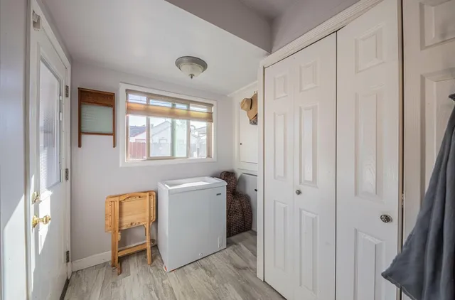 a view of a room with washer and dryer