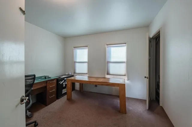 a room with furniture and window