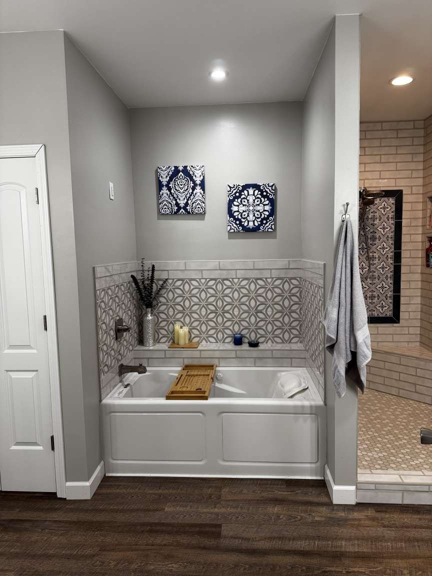 5056 Spencer Hale Road Morristown, TN 37813 - Photo 46 of 69 a bathroom with a bathtub and a shower
