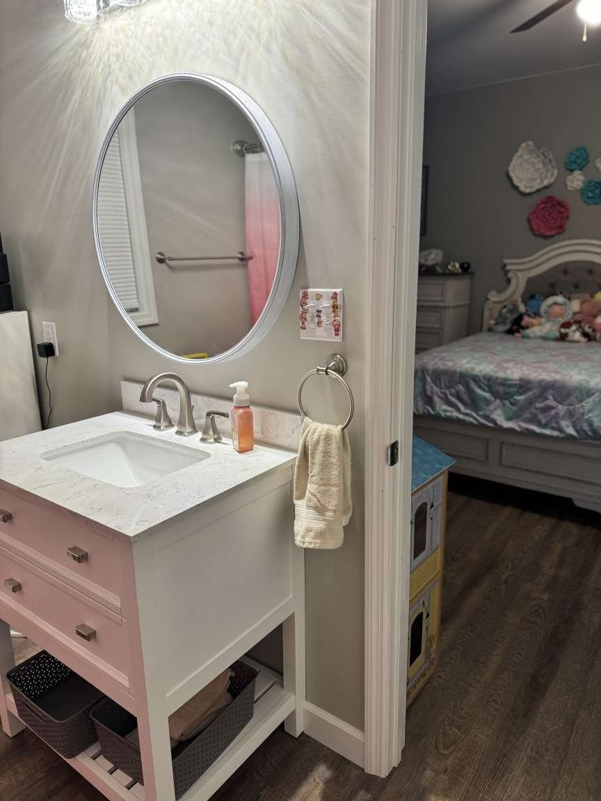 5056 Spencer Hale Road Morristown, TN 37813 - Photo 55 of 70 a bathroom with a granite countertop sink and a mirror
