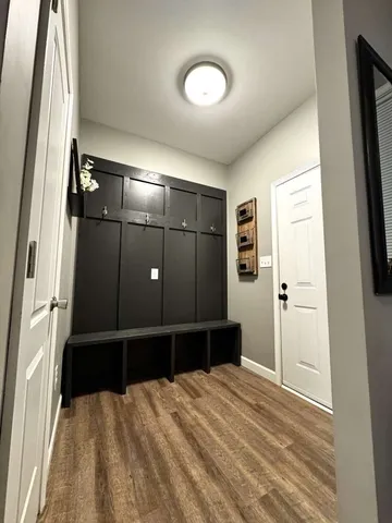 a kitchen with stainless steel appliances kitchen island granite countertop a stove and a refrigerator