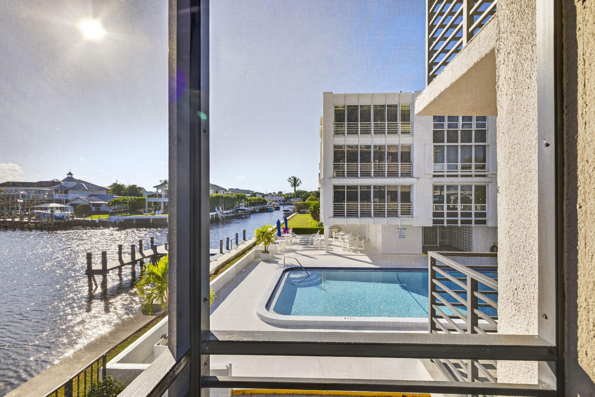 900 Northeast Spanish River Boulevard, Unit 2W Boca Raton, FL 33431 - Photo 27 of 47 pool view from balcomy