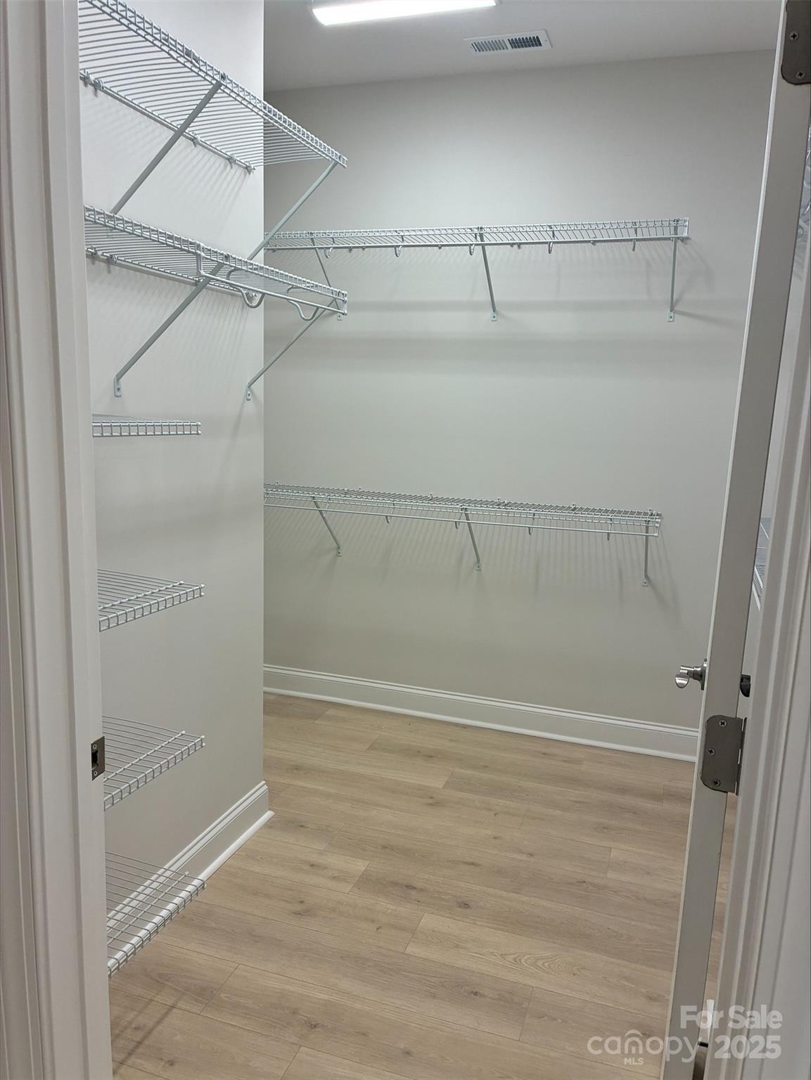 3027 Five Creek Road Charlotte, NC 28213 - Photo 7 of 17 a view of walk in closet