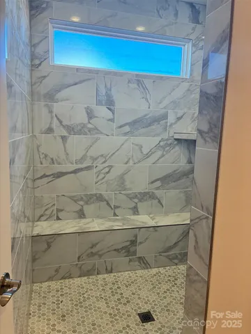 a close view of fireplace with wooden floor