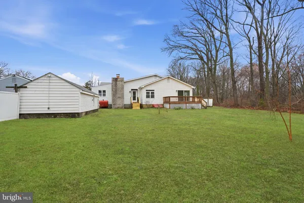 a view of a house with a big yard