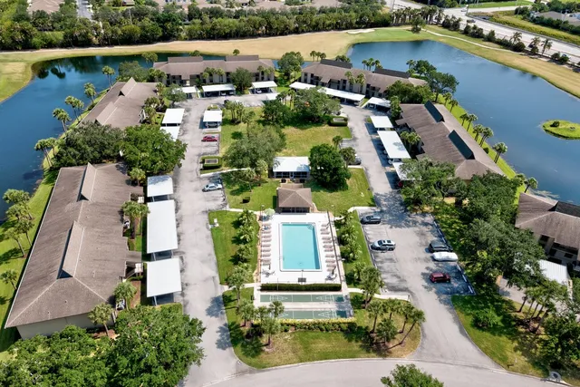 an aerial view of a house with a garden