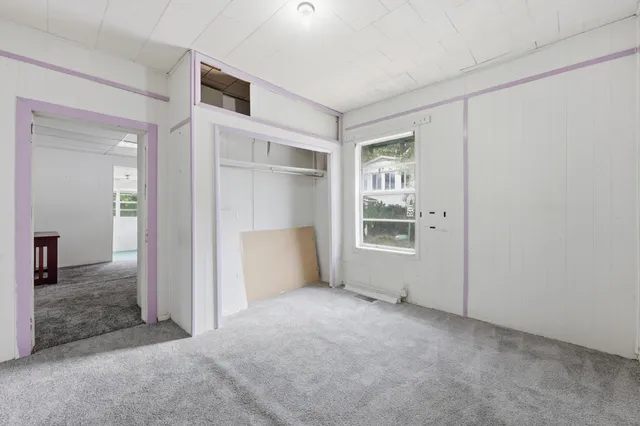 an empty room with windows