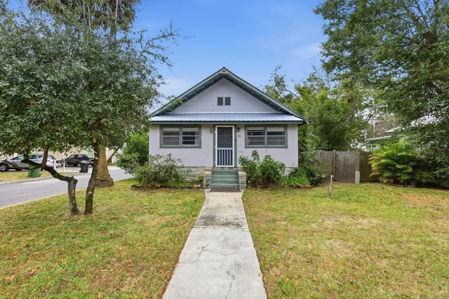 a house view with a garden space