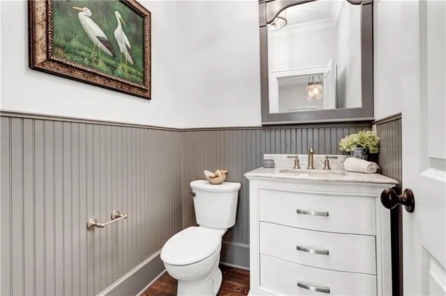 a view of room with furniture and wooden floor
