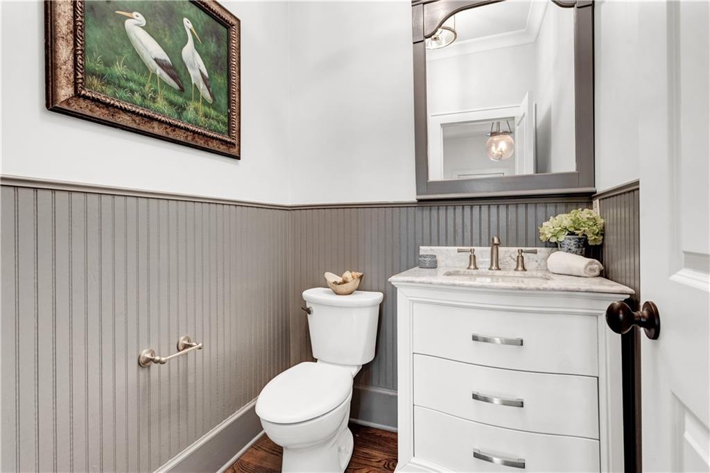 3081 Rhodenhaven Drive Northwest Atlanta, GA 30327 - Photo 18 of 57 a bathroom with a toilet a sink and mirror