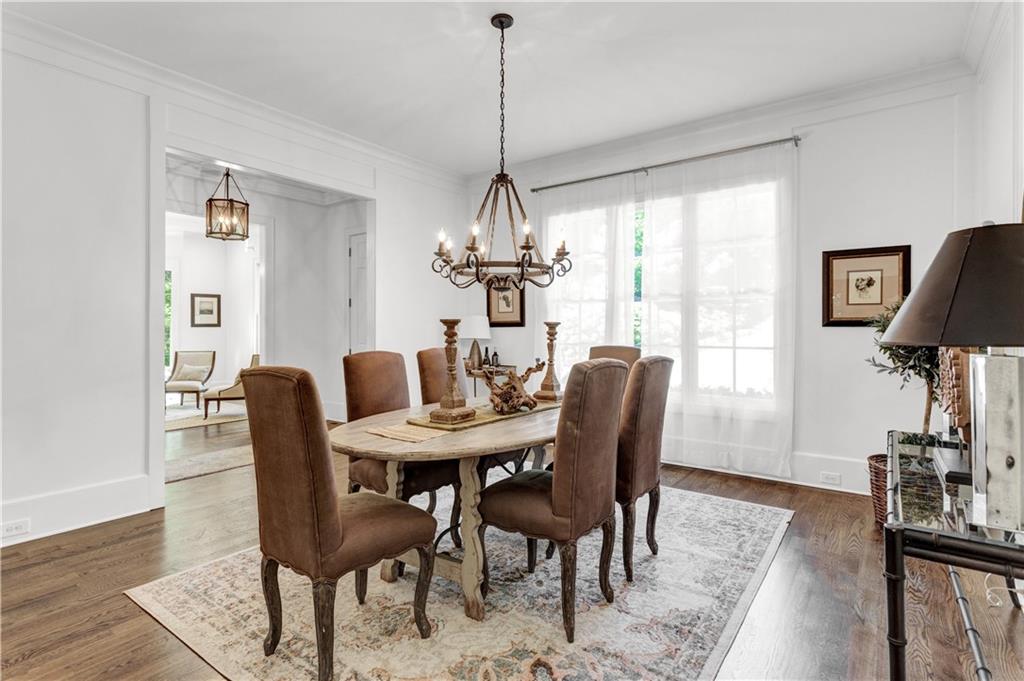 3081 Rhodenhaven Drive Northwest Atlanta, GA 30327 - Photo 21 of 57 a dining room with furniture window and wooden floor